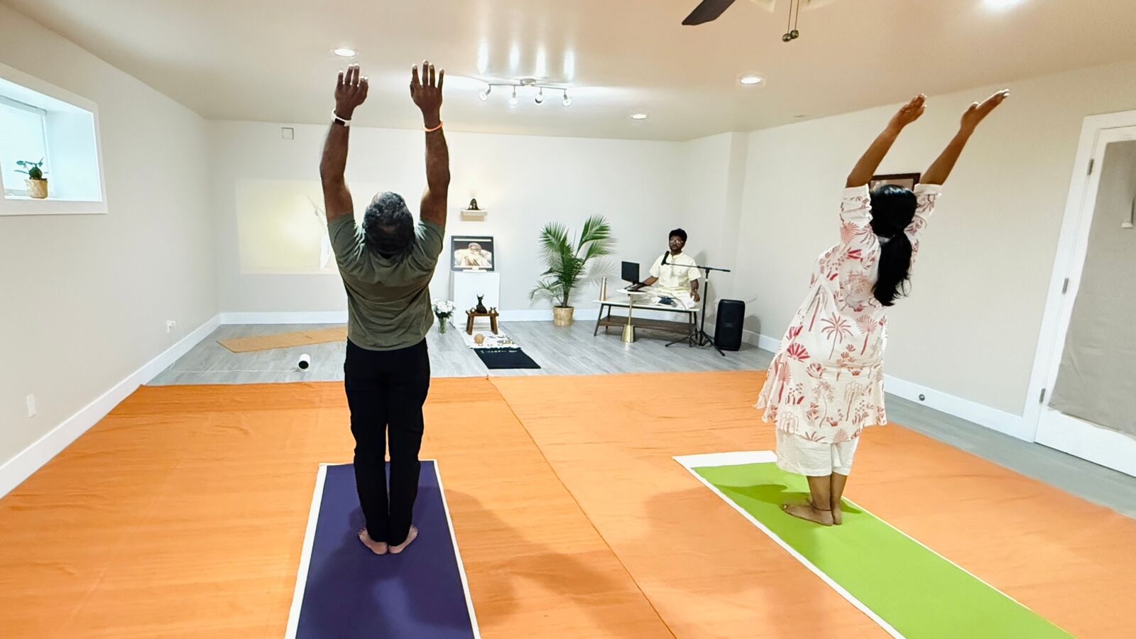 Student practising yoga at sunrise